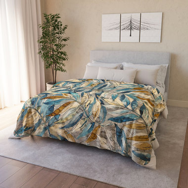 Large Watercolor Leaves Fleece Blanket on a bed