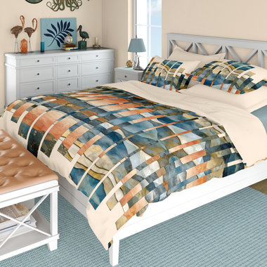 Abstract Boho Landscape queen duvet cover with matching pillow shams on a bed in a contemporary bedroom