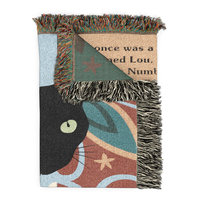 folded vat blanket showing fringe and reverse side