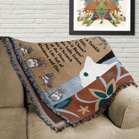 Folded banket on a couch.