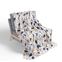 Botanical art printed on a lightweight, soft and fluffy two-sided reversible plush velveteen throw blanket in white, navy blue, tan, gray, orange and brown. One side is printed on a white background and the other side is printed on a navy blue background.