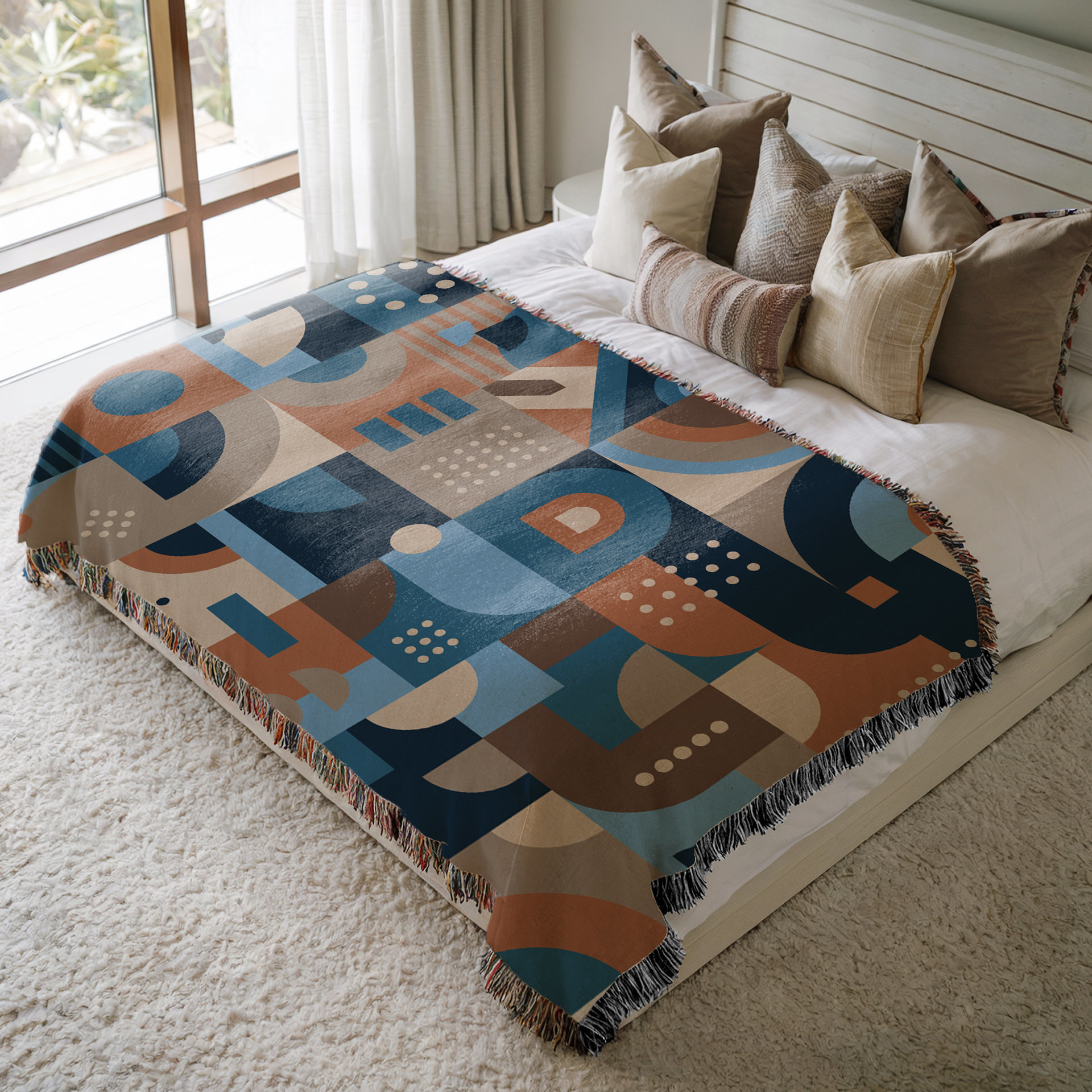 Blue and Brown Abstract Geometric Shapes Woven Cotton Blanket on a queen bed