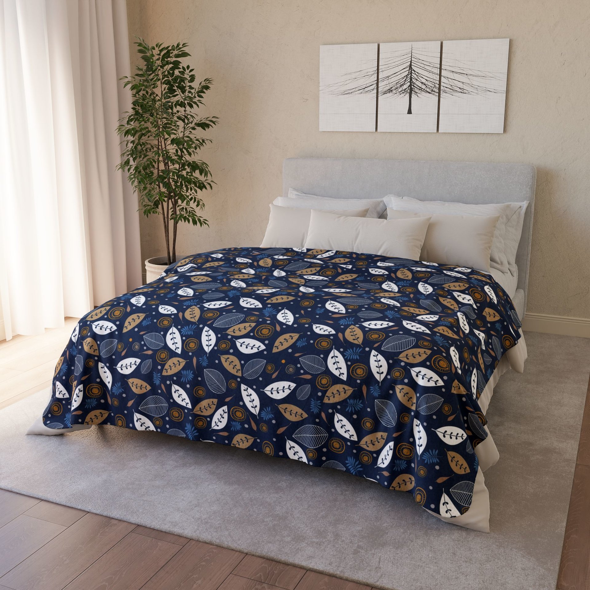 Botanical art printed on a lightweight, soft and fluffy two-sided reversible plush velveteen throw blanket in white, navy blue, tan, gray, orange and brown. One side is printed on a white background and the other side is printed on a navy blue background.