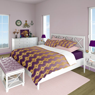 duvet cover printed with a bargello and ikat inspired gold flame striped pattern on a deep violet, muted lavender and soft pink ombré background.