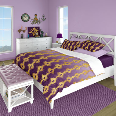 Purple Ombré and Gold Stripes queen duvet cover with matching pillow shams on a bed in a contemporary bedroom.